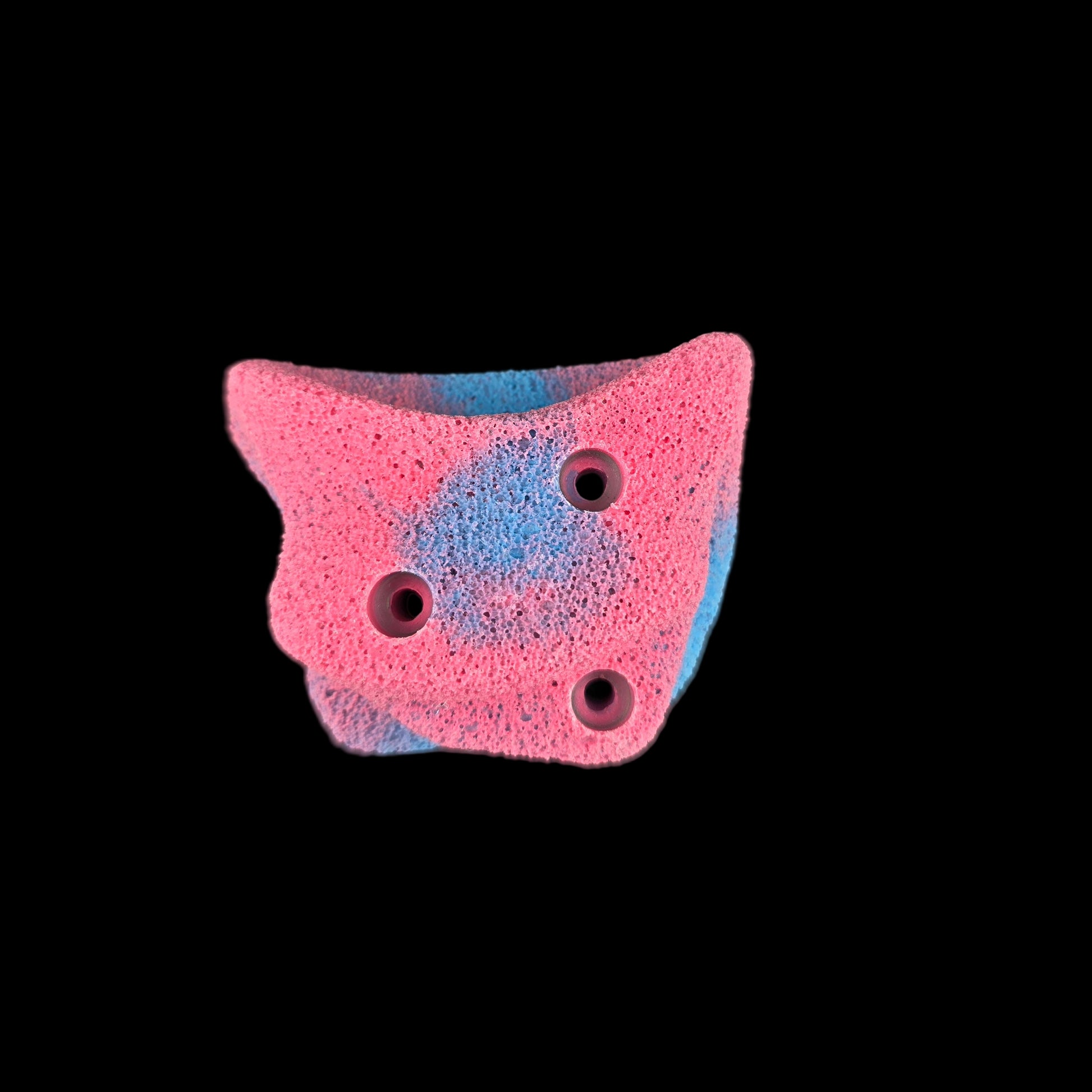 Pink and blue colored Blob Screw-on climbing hold