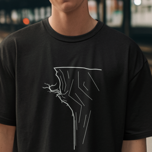 Closeup of man wearing black cliffside rock climbing t-shirt
