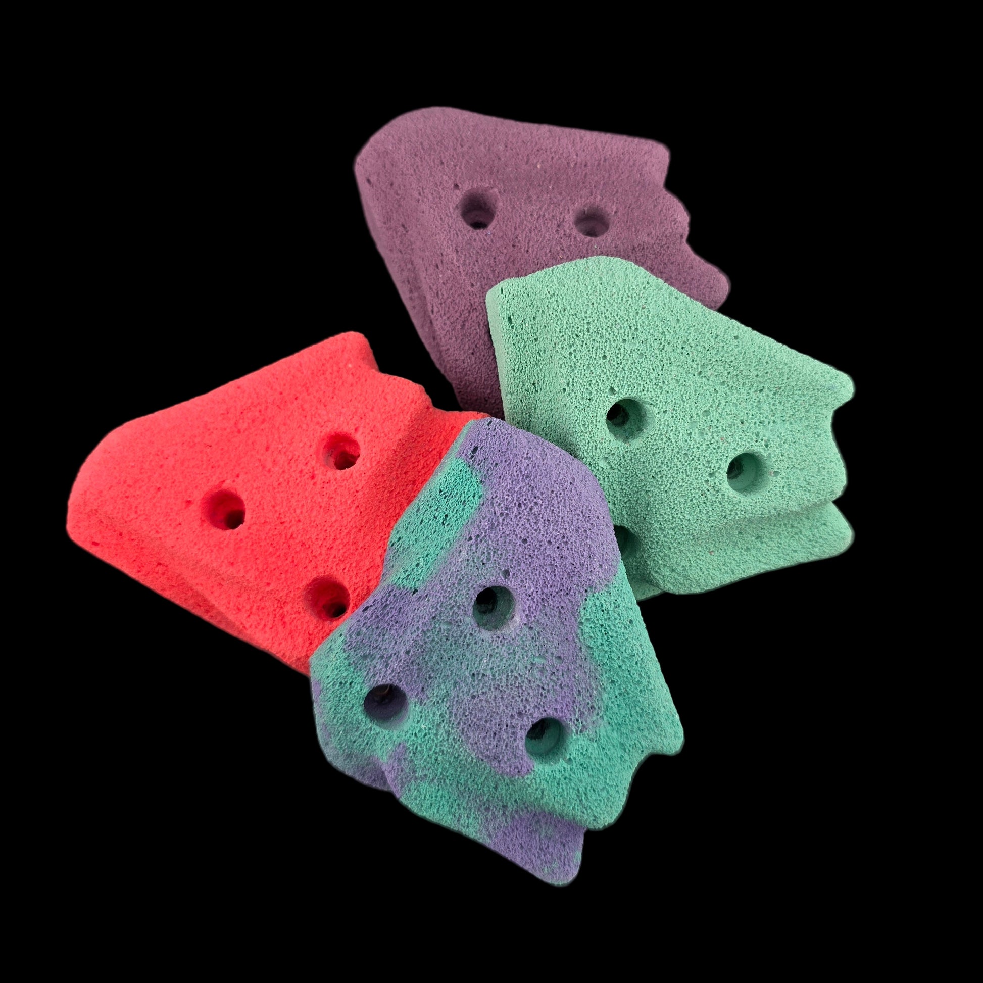 Pile different colored corner-less shaped climbing holds