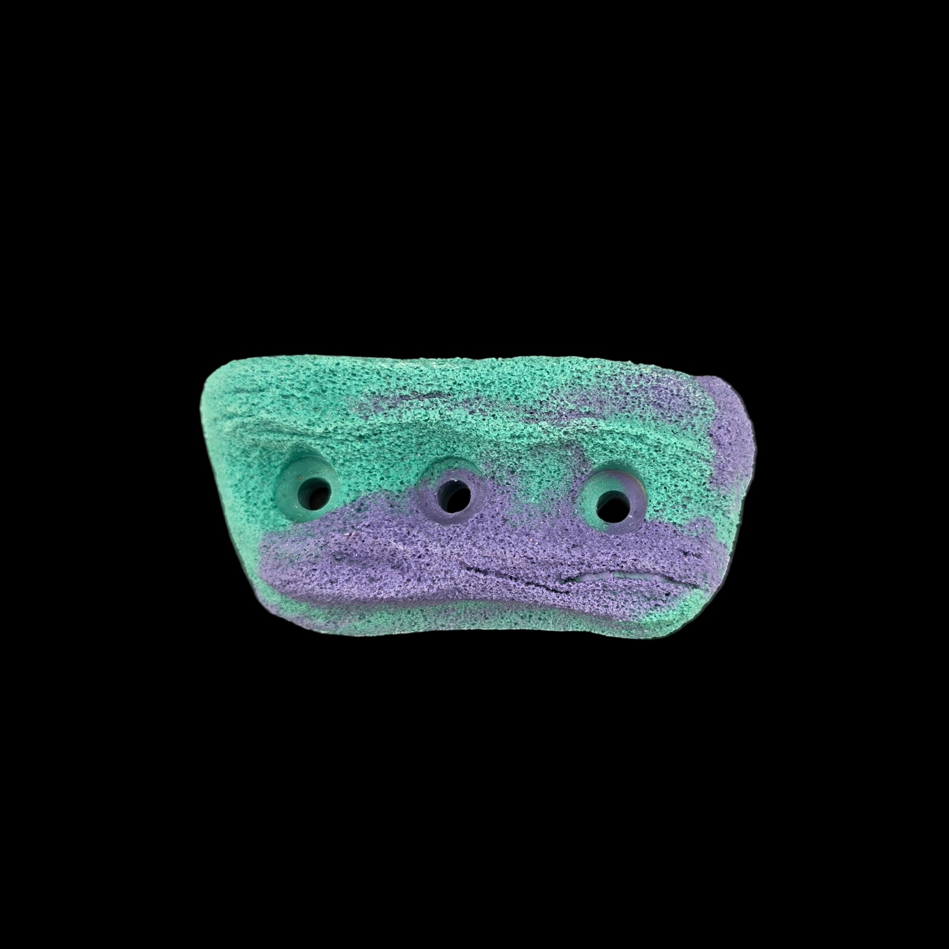 Purple and teal colored crimp shaped climbing hold