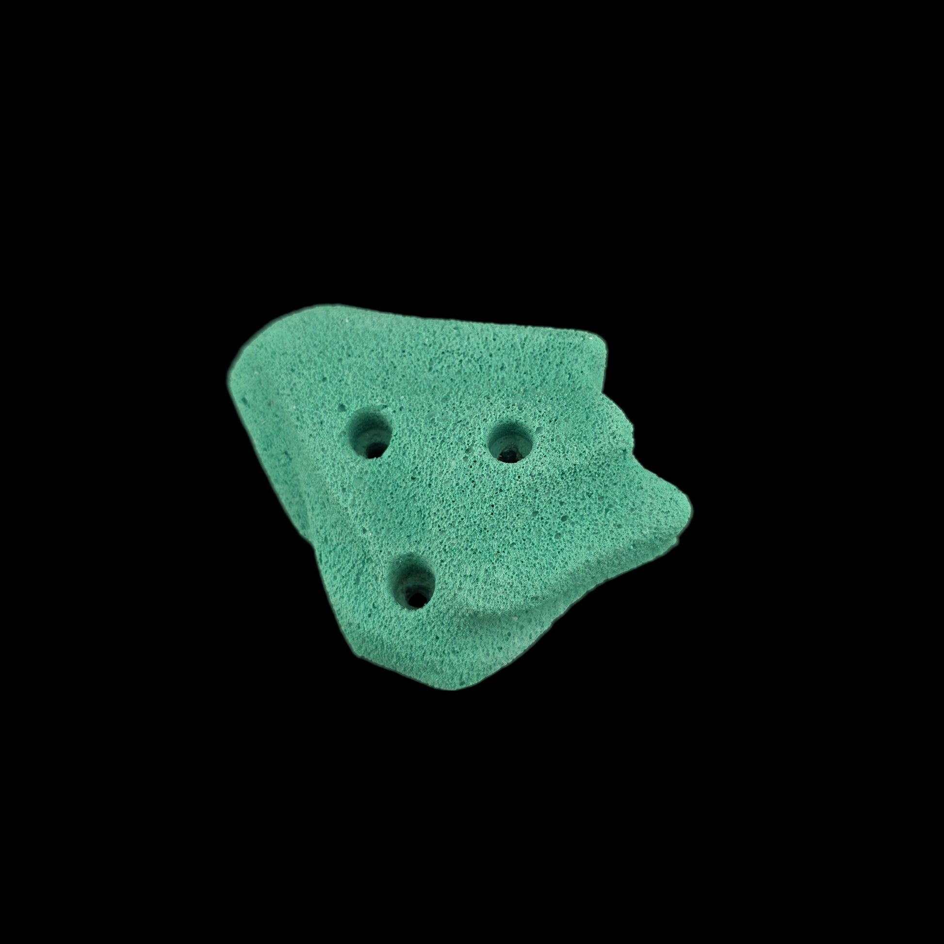 Teal colored corner-less jug shaped climbing hold