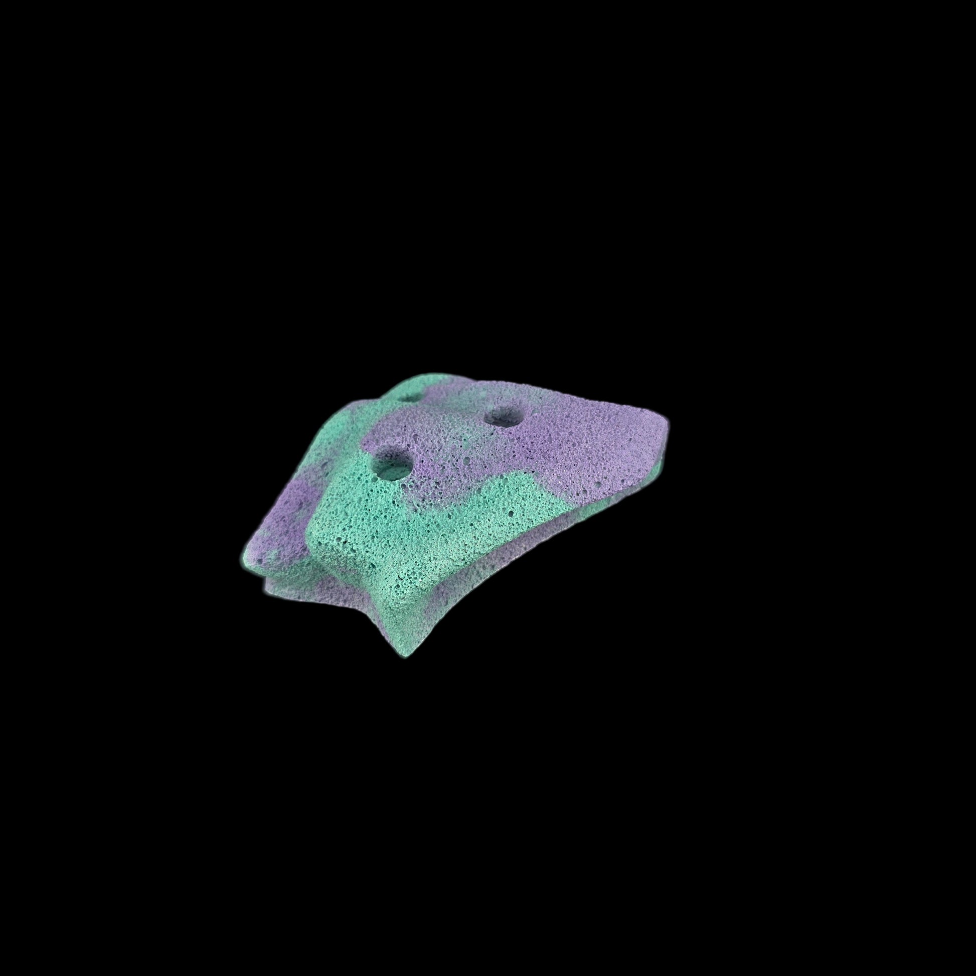 Teal and purple colored corner-less jug shaped climbing hold