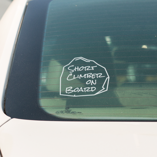 Short Climber on Board Decal on rear window of a car